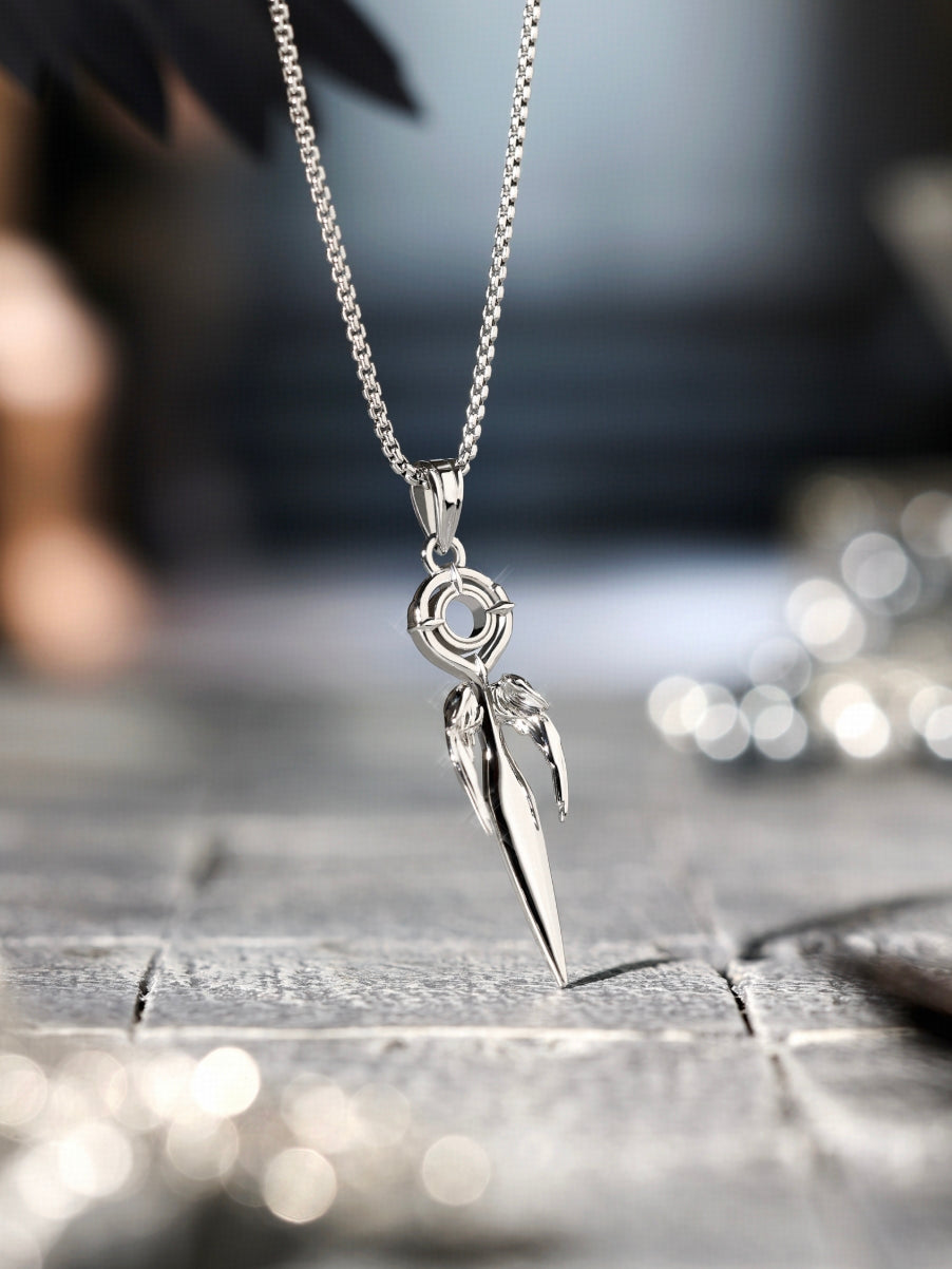 Inspired by the kunai, the design transforms the cold elegance of a traditional weapon into a refined wearable accessory. While preserving the kunai's clean, sharp lines, the addition of wing elements softens the overall form, creating a harmonious balance between strength and grace.