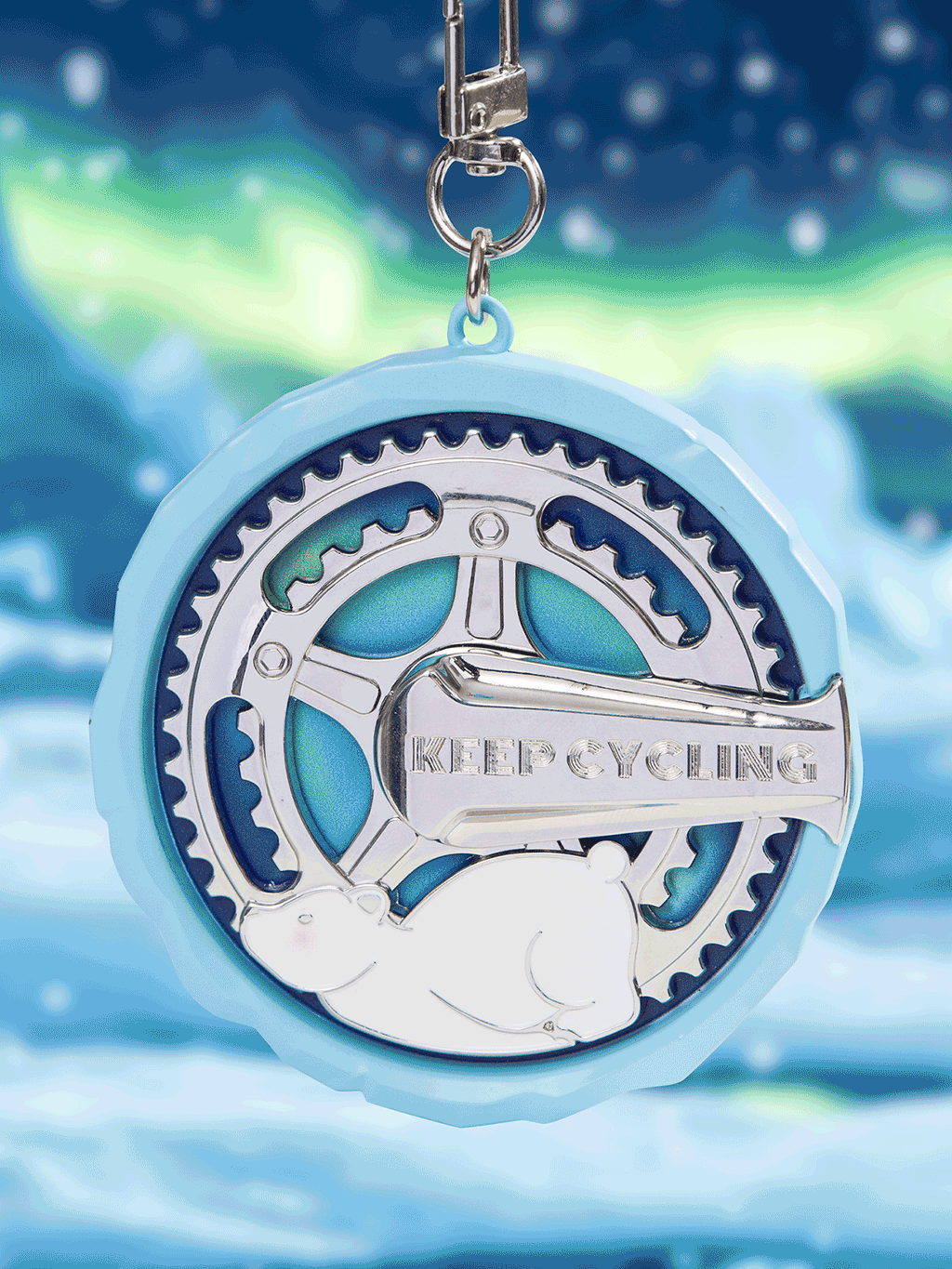The crank connecting the gears is engraved with “KEEP CYCLING”,
 which aligns with our brand name
 and also conveys the green philosophy of “keep cycling, low-carbon circulation”.
On the back of the medal, a globe design rotates in connection with the front gear.
 
It symbolizes that the power of cycling promotes ecological circulation and protects our Earth.
 It also adds fun to the medal,
 making every rotation a beautiful hope and protection for the planet.