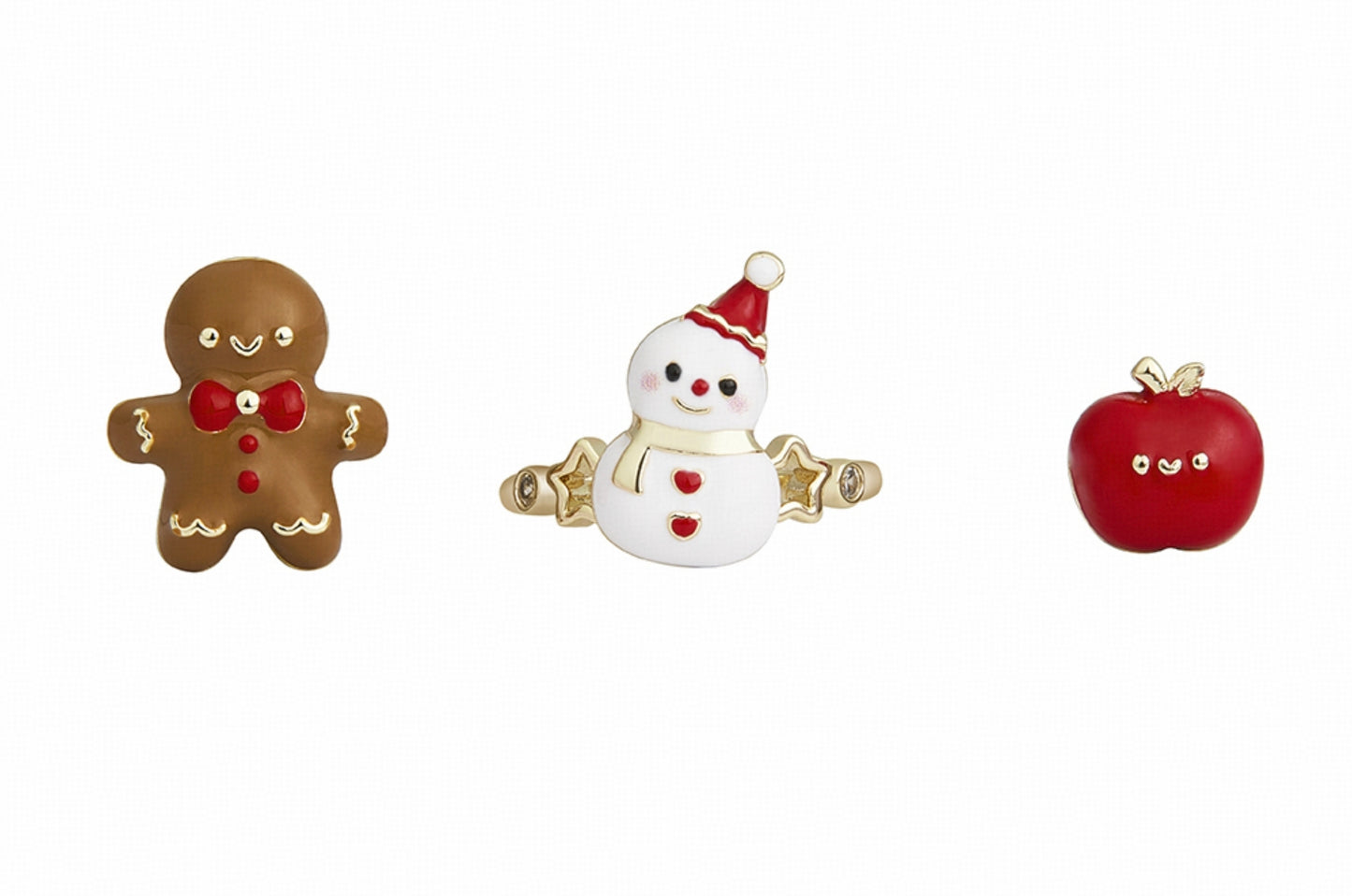 Interchangeable Magnetic Ring Tops

The ring consists of one adjustable band and three interchangeable magnetic ring tops, allowing you to switch styles with ease.

The three ring top designs echo the medal collection, featuring a snowman, gingerbread man, and red apple. Change the design to match your outfit or your mood, making every day a little more fun. Their signature dot eyes and smiling faces bring a cheerful touch—always happy to meet you.