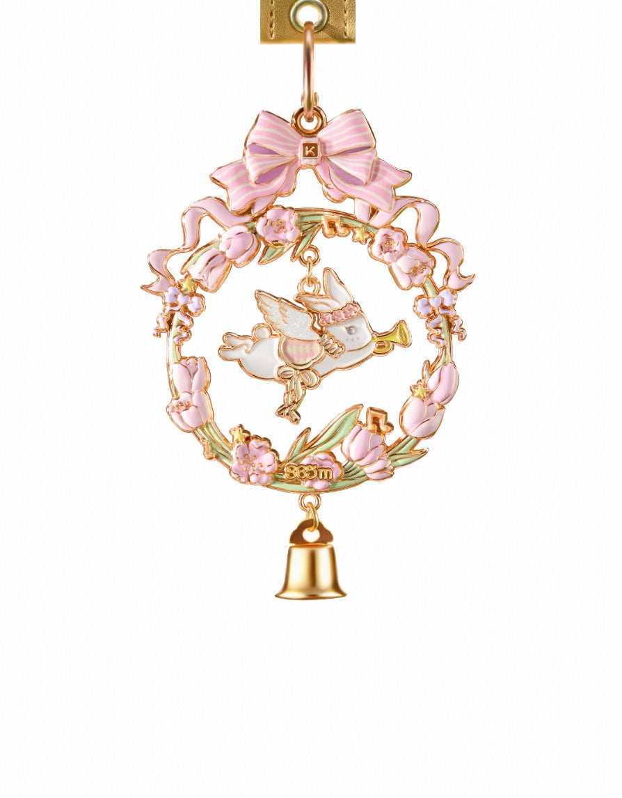 The floral wreath wind chime structure is paired with a three-dimensional pink-and-white striped bow on top.
Pink tulips intertwine with soft green stems and leaves,
gently blending into a fairy-tale spring atmosphere.

At the center of the wreath, a white flying rabbit wearing a floral crown and blowing a small trumpet leaps joyfully,
as if acting as a messenger of spring,
knocking on your heart with its melodic call.